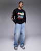 ASOS DESIGN ASOS DESIGN relaxed long sleeve T-shirt with ski sports graphic in black - 2