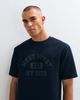 ASOS DESIGN ASOS DESIGN relaxed T-shirt with collegiate graphic in navy - 1