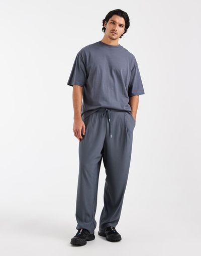 ASOS DESIGN ASOS DESIGN relaxed taper pleated sweatpants in blue-Gray