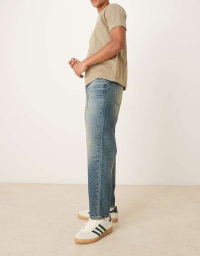 ASOS DESIGN ASOS DESIGN relaxed tapered jeans in dark wash blue with tint