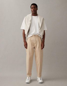 ASOS DESIGN ASOS DESIGN relaxed tapered jeans in ecru-Neutral
