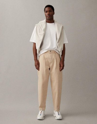 ASOS DESIGN ASOS DESIGN relaxed tapered jeans in ecru-Neutral