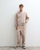 ASOS DESIGN ASOS DESIGN relaxed tapered scuba-style fabric sweatpants in neutral - 1
