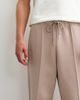 ASOS DESIGN ASOS DESIGN relaxed tapered scuba-style fabric sweatpants in neutral - 4