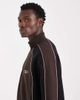 ASOS DESIGN ASOS DESIGN relaxed track jacket with cut & sew panels and prints in brown - 4