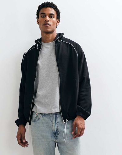 ASOS DESIGN ASOS DESIGN relaxed zip through funnel neck hoodie with piping and cinch in black
