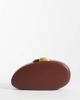 ASOS DESIGN ASOS DESIGN round hardbox clutch with gold hardware in chocolate-Brown - 4