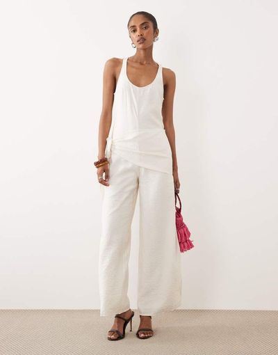 ASOS DESIGN ASOS DESIGN satin crinkle jumpsuit with scarf waist detail in cream-White