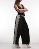 ASOS DESIGN ASOS DESIGN satin wide leg pants with lace in black - 1