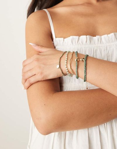 ASOS DESIGN ASOS DESIGN shell design bracelet 5 pack in gold tone