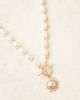 ASOS DESIGN ASOS DESIGN short t-bar necklace in faux pearls with gold tone sun pendant - 2