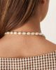ASOS DESIGN ASOS DESIGN short t-bar necklace in faux pearls with gold tone sun pendant - 3