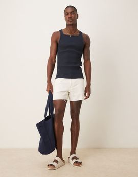 ASOS DESIGN ASOS DESIGN shorter length slim denim shorts with rip detail in white