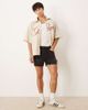 ASOS DESIGN ASOS DESIGN shorter length straight fit denim shorts with rip detail in black wash - 1