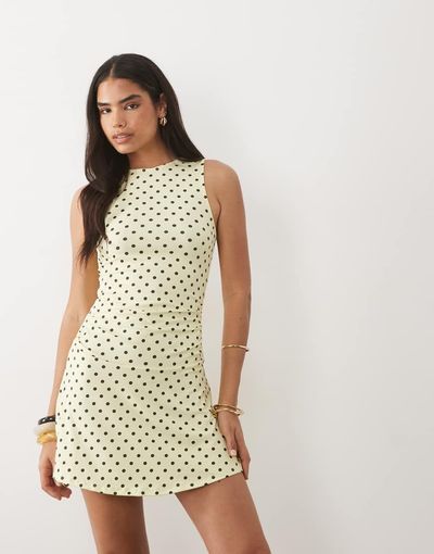 ASOS DESIGN ASOS DESIGN sleeveless with peplum skirt mini dress in yellow polka dot print-Multi