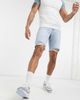 ASOS DESIGN ASOS DESIGN slim denim shorts in light wash blue with raw hem - 1