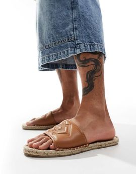 ASOS DESIGN ASOS DESIGN slip on espadrilles in tan monogram-Brown