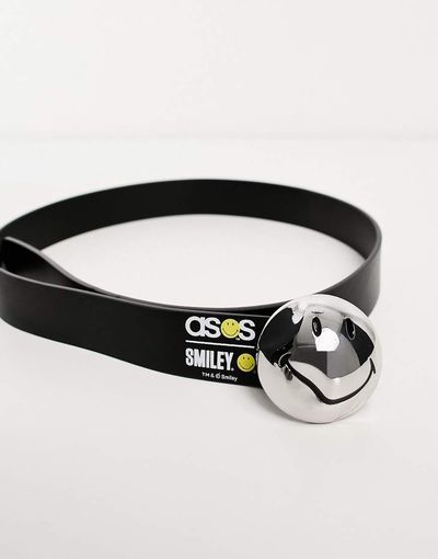 ASOS DESIGN ASOS Design Smiley Collab faux leather belt with warped buckle in black