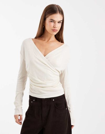 ASOS DESIGN ASOS DESIGN soft jersey drape wrap long sleeve top in cream-White
