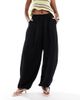 ASOS DESIGN ASOS DESIGN soft textured oversized billow pants with tie hem in black - 2