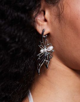 ASOS DESIGN ASOS DESIGN statement earrings with spider design and faux pearls in silver tone