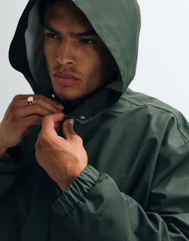 ASOS DESIGN ASOS DESIGN stormMAX™ water repellent oversized raincoat in dark green