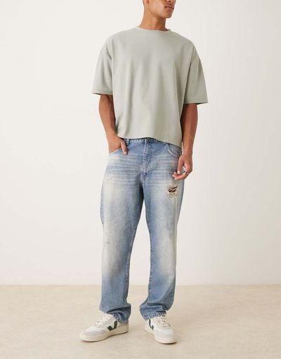 ASOS DESIGN ASOS DESIGN straight leg jeans in mid wash blue with rips