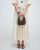 ASOS DESIGN ASOS DESIGN straw clutch purse with resin ball handle in chocolate-Brown - 2
