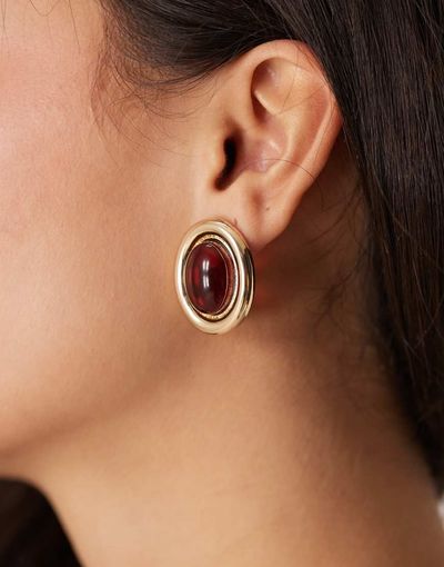 ASOS DESIGN ASOS DESIGN stud earrings with burgundy stone set design in gold tone