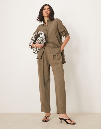 ASOS DESIGN ASOS DESIGN tab waist detail tapered pants in khaki green - part of a set