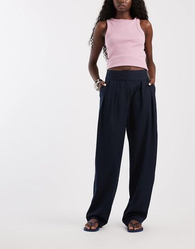 ASOS DESIGN ASOS DESIGN tailored double pleated tapered pants in navy-Green