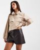 ASOS DESIGN ASOS DESIGN Tailored faux leather micro shorts in brown - 1