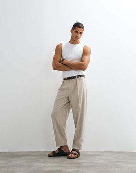 ASOS DESIGN ASOS DESIGN tailored pleated oversized tapered pants with rolled cuffs in ecru-Neutral