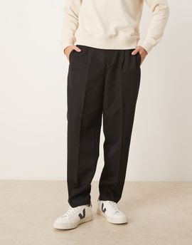 ASOS DESIGN ASOS DESIGN tailored pleated relaxed tapered pants with elastic waistband in black