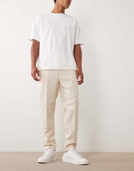 ASOS DESIGN ASOS DESIGN tailored tapered pants with elastic waist and rolled cuffs in ecru-White