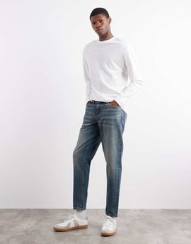 ASOS DESIGN ASOS DESIGN tapered fit jeans with tint in mid wash blue