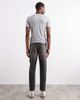 ASOS DESIGN ASOS DESIGN tapered fit jeans with yellow tint in washed black - 2