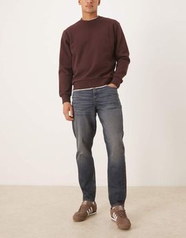 ASOS DESIGN ASOS DESIGN tapered jeans in dark-wash blue with tint