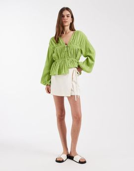 ASOS DESIGN ASOS DESIGN tie side wrap over linen skort in white