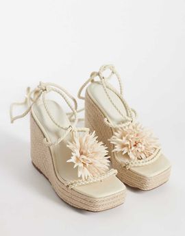 ASOS DESIGN ASOS DESIGN Topaz square toe wedge with flower trim in beige-Neutral