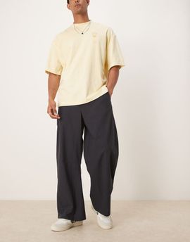 ASOS DESIGN ASOS DESIGN twisted horseshoe pants in black