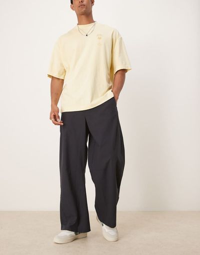 ASOS DESIGN ASOS DESIGN twisted horseshoe pants in black