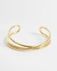 ASOS DESIGN ASOS DESIGN waterproof stainless steel cuff bracelet with cross-over design in gold tone - 1