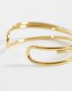 ASOS DESIGN ASOS DESIGN waterproof stainless steel cuff bracelet with cross-over design in gold tone - 2
