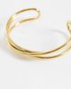 ASOS DESIGN ASOS DESIGN waterproof stainless steel cuff bracelet with cross-over design in gold tone - 3