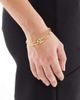 ASOS DESIGN ASOS DESIGN waterproof stainless steel cuff bracelet with infinity detail in gold tone with gift bag - 1