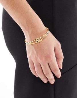 ASOS DESIGN ASOS DESIGN waterproof stainless steel cuff bracelet with infinity detail in gold tone with gift bag