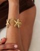 ASOS DESIGN ASOS DESIGN waterproof stainless steel cuff with starfish design in gold tone - 2