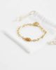 ASOS DESIGN ASOS DESIGN waterproof stainless steel oval faux tigers eye bracelet in gold - 3