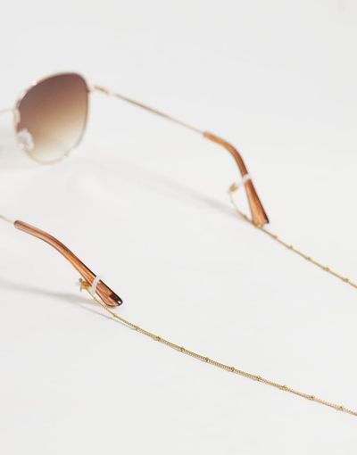 ASOS DESIGN ASOS DESIGN waterproof stainless steel sunglasses chain with dot detailing in gold tone